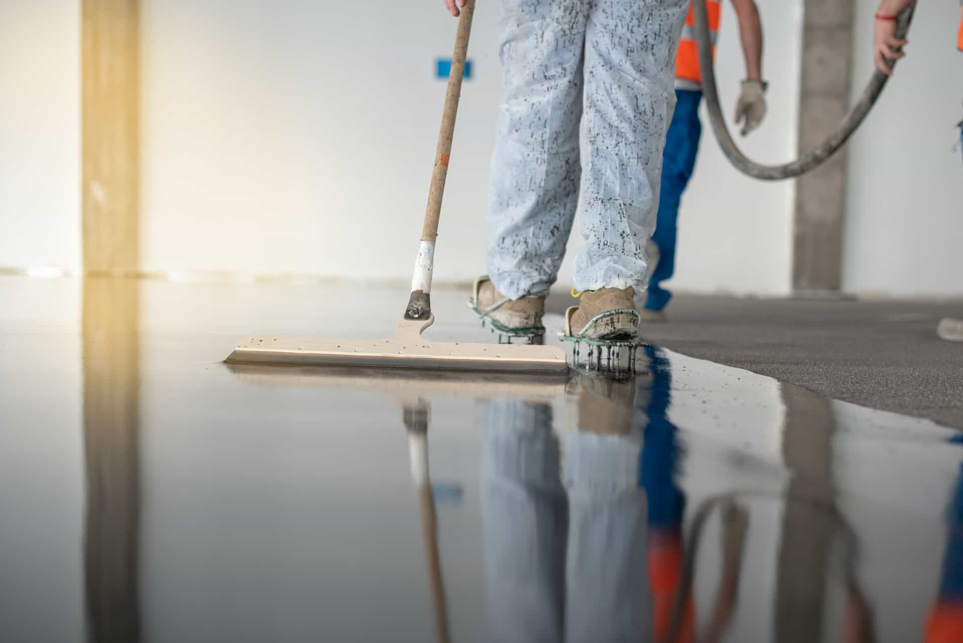 Darling Downs Epoxy team applying epoxy flooring
